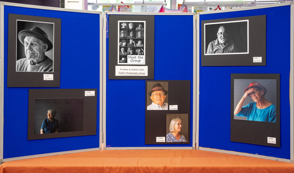 display board with members work on it